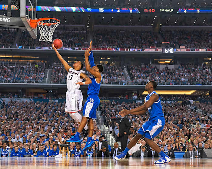 under fire
Napier (above) led the Huskies to the 2014 NCAA championship, but his comments about going to bed hungry made headlines—and caught the attention of Booker, who had joined the Senate in ’13.